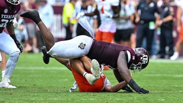Texas A&M Aggies defensive lineman Shemar Turner (5) sacks Sam Houston State Bearkats quarterback Jordan Yates (13) during the first quarter at Kyle Field.